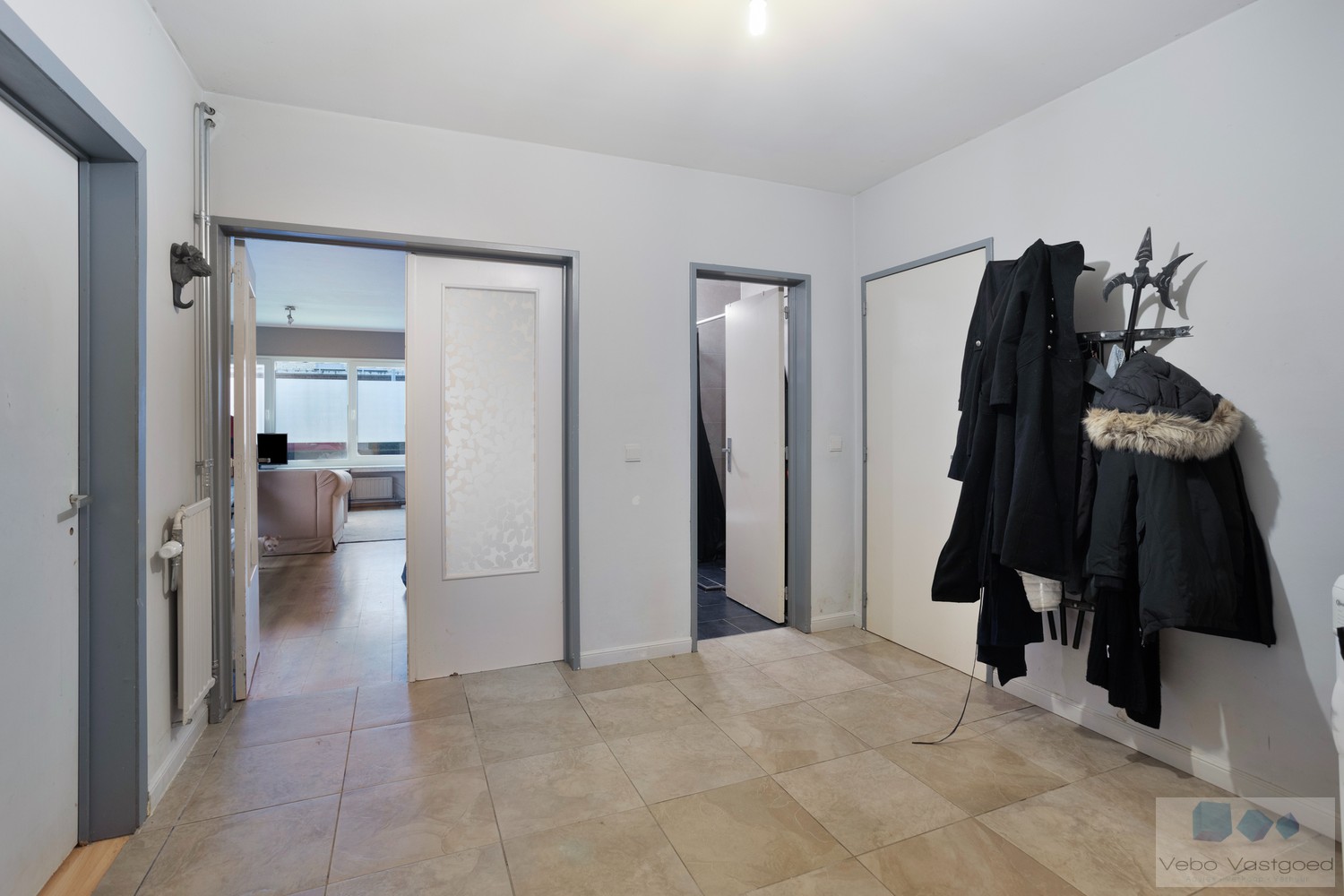 Ruim gelijkvloersappartement met 3 slks en garage - foto 2