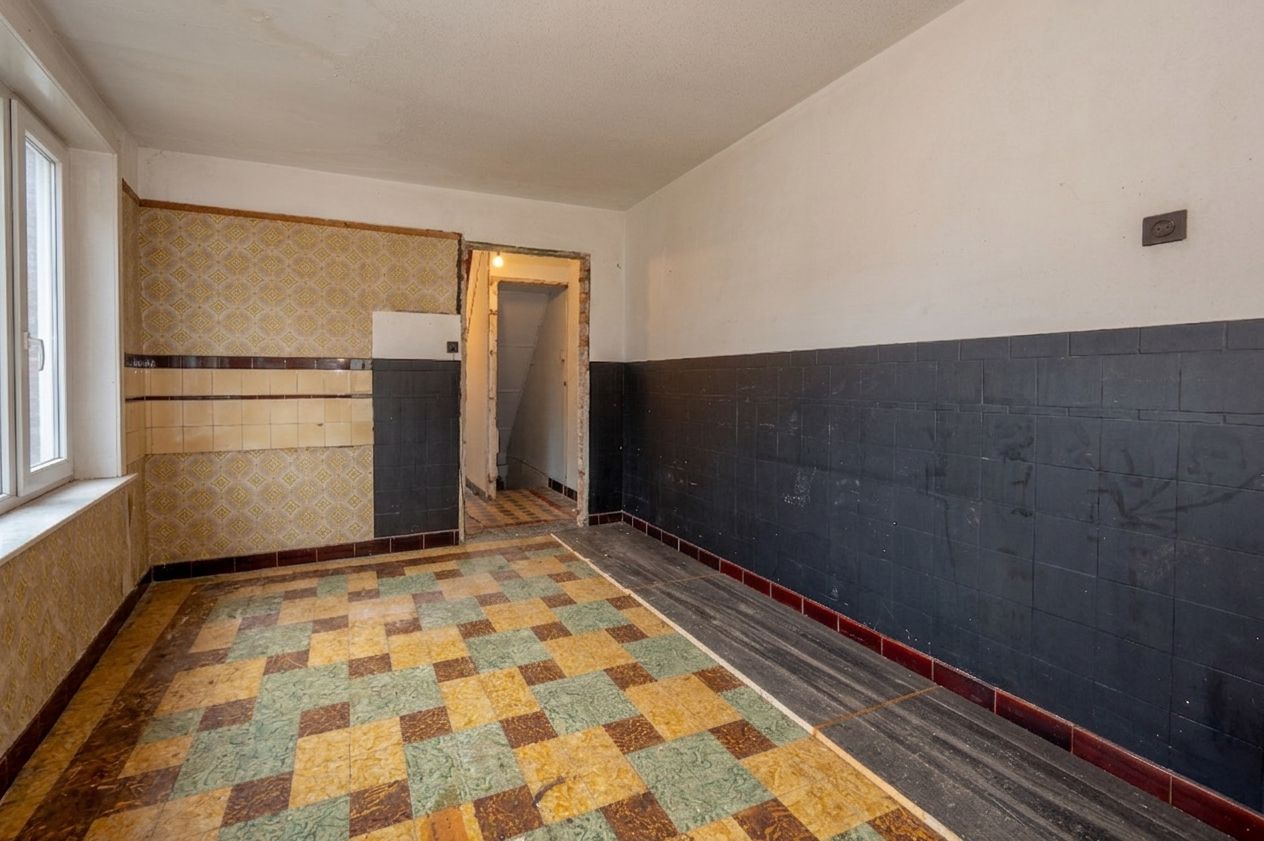 Te renoveren halfopen woning met zuidgerichte tuin op een perceel van 442 m² - foto 4