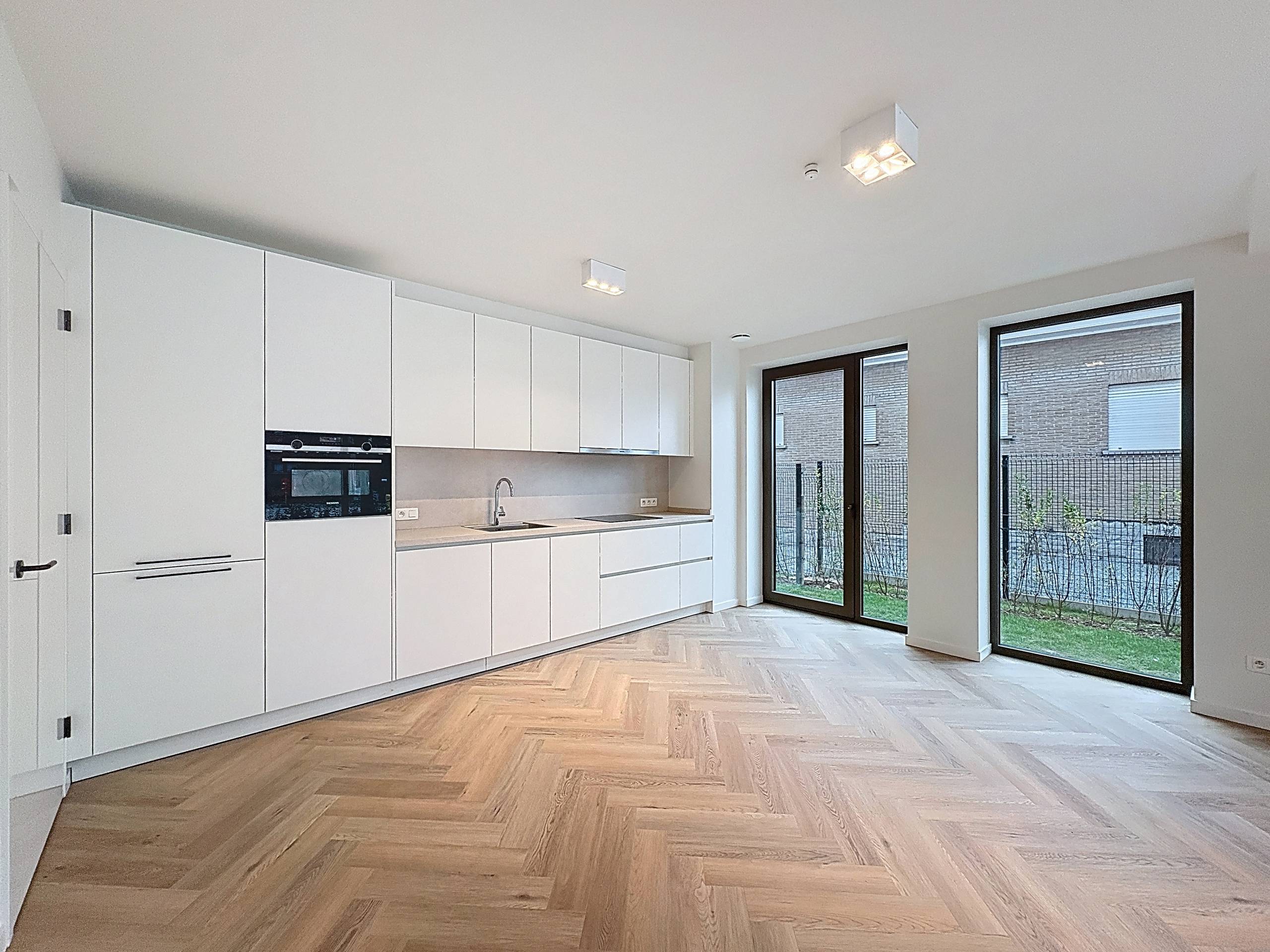 Nieuwbouwappartement met tuin in Grimbergen - foto 2