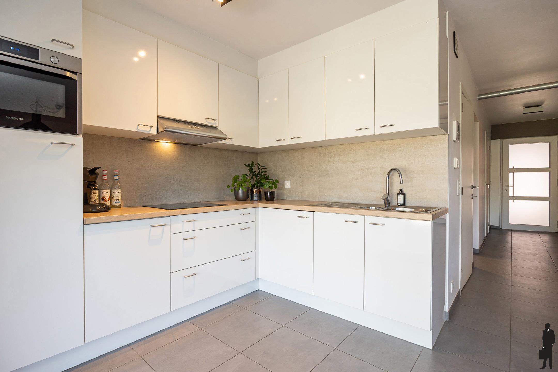 Recent gelijkvloers appartement met staanplaats en tuin - foto 5