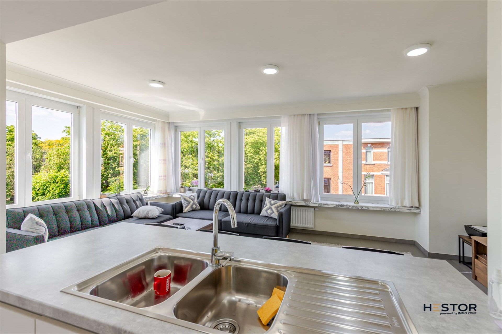 Opbrengsteigendom bestaande uit 6 appartementen en 6 garages - foto 4