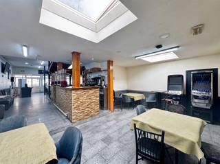 <p><span><strong>Income property with a ground-floor retail space and three apartments | Net return of more than 5%</strong></span></p><p><span>Located in a central and easily accessible area of Antwerp, this versatile investment property represents an attractive opportunity for investors seeking a combination of stable rental income and additional future potential. The property combines a spacious commercial space with three apartments above, ensuring that income is well-diversified across different rental units.</span></p><p><span>The ground floor features a commercial area of approximately 276 m² and is currently set up as a restaurant or bar. At the rear, there is also a spacious multipurpose area of approximately 110 m². This space still needs to be renovated but offers various possibilities depending on its future use. For example, it could be used as storage, a workshop, additional commercial space, or an extension of the existing commercial use. This presents interesting potential for further optimizing the current use and rental income over time.</span></p><p><span>The upper floors contain three spacious apartments. The first-floor apartment has an area of approximately 88 m², as does the second-floor apartment. The penthouse apartment measures approximately 75 m². The combination of the three residential units with the commercial ground floor provides an attractive mix of rental income and a good balance across the property.</span></p><p><span>The property currently generates a net rental yield of more than 5%, making it an attractive option for both experienced investors and buyers seeking an income-generating property with a solid foundation and additional long-term potential.</span></p><p><span>Significant technical investments have also already been made. For example, the roof was completely renovated in 2026 and fitted with new roofing and no less than 12 cm of roof insulation. In addition, the apartments have favorable EPC ratings, which positively impacts the property’s rental potential and overall investment profile.</span></p><p><span>The location is a major additional asset. The building is centrally located in Antwerp, with shops, public transportation, and major access roads in the immediate vicinity. The center of Antwerp and Park Spoor Noord are also easily accessible. Thanks to this central location, there is strong demand for both commercial and residential spaces, which benefits the rental potential of the various units.</span></p><p><span>In other words, this income-generating property combines an attractive current yield with an interesting commercial use, three leased or leasable apartments, and additional potential thanks to the multipurpose space at the rear. A versatile investment in a central Antwerp location with room for further optimization.</span></p>