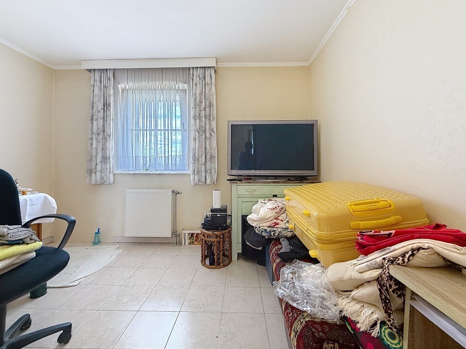 Goed gelegen woning met 3 slaapkamers én achterliggende garage - foto 5