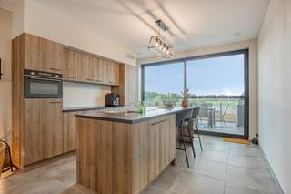This stylish apartment is located in the center of Londerzeel, so shops, restaurants, schools, public transport and all daily amenities are within walking distance. At the same time, from the spacious terrace, you can enjoy a unique and relaxing view over the fields behind — a very pleasant combination of central living and open views.<br /><br />The apartment is ready to move in and has a modern finish and has a pleasant living space with lots of natural light, a contemporary kitchen and two full bedrooms. Thanks to the solar panels and the EPB label A, you also benefit from a very energy-efficient home with low energy costs.<br /><br />An absolute asset is the large terrace, where you can enjoy morning coffee, an aperitif or a pleasant summer evening with a beautiful view of the green landscape.<br /><br />Advantages at a glance:<br />- Top location in the center of Londerzeel<br />- Year of construction 2022<br />- Ready to move in and modern<br />-2 bedrooms<br />- Solar panels<br />- Ben apartment<br />- EPB label A — highly energy efficient<br />- Large terrace with stunning views over the fields<br />- 1 private parking space included<br />- Shops, restaurants and facilities nearby<br />- Ideal as a private home or an interesting investment<br /><br />A contemporary apartment with comfort, energy efficiency and exceptional views, located in one of the most practical locations in Londerzeel.<br /><br />Are you looking for an apartment where you can move in without worries and where you can enjoy space, light and greenery every day? Then this apartment is definitely worth a visit: olivia.laporte@dewaele.com<br /><br />The property is offered through the Pre-sale formula. On 03/10/2026 between 10:00 and 12:00, you can come visit the appartment by appointment and make an offer. The listed price is a starting price. For further information, please contact the property agent.<br /><br />Register of measures: no