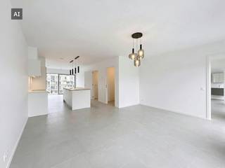 Dit instapklare nieuwbouwappartement bevindt zich op de tweede verdieping van het prestigieuze woonproject Kolenkaai in Brugge. Je woont hier in een groene oase vlak bij het Baron Ruzettepark, met de historische Brugse binnenstad, lokale handelaars en openbaar vervoer op wandel- en fietsafstand. Een perfecte combinatie van rustig, duurzaam wonen en de levendigheid van de stadsrand.<br /><br />Indeling:<br /><br />-1°V:<br />- Ondergrondse autostaanplaats <br />- Gemeenschappelijke fietsenstalling<br /><br />2°V: (ca. 80 m²)<br />- Inkomhal met apart gastentoilet <br />- Ruime en lichtrijke leefruimte met een naadloos aansluitende open keuken. De keuken is kwalitatief afgewerkt en voorzien van alle comfort: combi-oven, koelkast, vaatwasser, kookplaat en dampkap.<br />- Praktische berging met aansluiting voor een wasmachine en droogkast <br />- Volwaardige slaapkamer <br />- Strakke badkamer voorzien van een ruime inloopdouche en een badkamermeubel met lavabo <br />- Royaal terras waar je heerlijk kan ontspannen <br /><br />Algemeen:<br /><br />- Huurprijs: € 990,00/maand<br />- Provisie gemeenschappelijke delen: € 75,00/maand<br />- Provisie eigen verbruik (verwarming/koeling/water): €100,00/maand <br />- Beschikbaarheid: Onmiddellijk <br />- Uiterst energiezuinig: voorzien van vloerverwarming én passieve koeling (geothermie)<br />- Volledig geschilderd en voorzien van lichtarmaturen en gordijnrails<br /><br /><br />De snelste manier om een bezoek te brengen aan dit pand? Vraag je bezoek aan via de roze knop op onze website (www.dewaele.com) en je wordt gecontacteerd door onze verhuurexpert Steffi.<br /><br />Telefonisch kunnen er geen afspraken gemaakt worden. Bij andere vragen kun je ons telefonisch contacteren via 050 444 999.<br /><br />Deze AI-visualisaties zijn bedoeld als inspiratie. Er werd geen rekening gehouden met technische specificaties, stedenbouwkundige voorschriften of de concrete mogelijkheden tot realisatie.
