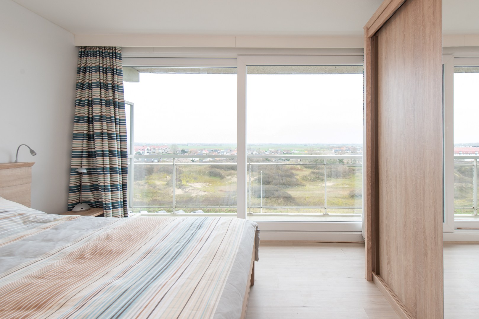 Lichtrijk doorloopappartement op het 5de verdiep - foto 3