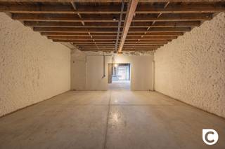 <h2><span>Unique warehouse/garage of approx. 360 m² for sale on Markgravelei </span></h2><p><span>Welcome to this exceptionally spacious garage and warehouse space of approx. 360 m², situated in a strategic location on Markgravelei. A property of this size, with this layout and versatile usage options, is exceptionally rare in this location and offers a unique opportunity for entrepreneurs, investors, and private individuals.</span></p><p><span>Behind the beautiful, authentic facade lies a surprisingly large and versatile space that can be fully customized to your own preferences. Consider, for example, a local contracting business, an installation company, a studio, a classic car collection, an e-commerce operation, storage space, a workshop, or a combination of office and storage.</span></p><h3><span>Spacious Ground Floor</span></h3><p><span>The ground floor measures approximately 218 m² and was recently fitted with a new concrete floor, meaning renovation work here can be kept to a minimum.</span></p><p><span>Access is via an automatic gate approximately 3.80 m wide and 2.20 m high, providing easy access for vehicles, equipment, and goods. The open space can be fully customized to meet the new owner’s needs.</span></p><h3><span>Additional rooms on the upper floors</span></h3><p><span>The first floor, measuring approximately 80 m², contains three rooms. Part of this space has already been finished with drywall and can be further customized and optimized to suit personal preferences. These spaces are ideal for use as offices, meeting rooms, studios, or support workspaces.</span></p><p><span>The second floor, measuring approximately 62 m², also comprises three rooms. This floor, too, offers numerous possibilities and can be perfectly configured as office space, a studio, storage, or a multipurpose room.</span></p><p><span>Both floors are equipped with heating, and plumbing with a toilet is already in place. Additionally, there is the option to install a kitchen and/or bathroom.</span></p><p><span>The combination of its authentic charm, exceptional square footage, convenient access, multiple floors, and versatile uses makes this property a truly unique opportunity.</span></p><p><span> </span></p><h3><span>Key Features at a Glance</span></h3><ul><li><span>Unique and rare property on Markgravelei</span></li><li><span>Approx. 360 m² total floor area</span></li><li><span>New concrete floor on the ground floor</span></li><li><span>Automatic gate approx. 3.80 m wide and 2.20 m high</span></li><li><span>Roofs in good condition</span></li><li><span>Electrical system up to code</span></li><li><span>Asbestos-safe</span></li><li><span>Plumbing already in place</span></li><li><span>Numerous potential uses: business, workshop, storage, e-commerce, offices, classic cars, contracting, installation work...</span></li><li><span>A property that can be customized to your own specifications</span></li></ul><p><span> </span></p><p><span>A unique opportunity in a strategic location on Markgravelei for those seeking space, flexibility, and possibilities.</span></p>