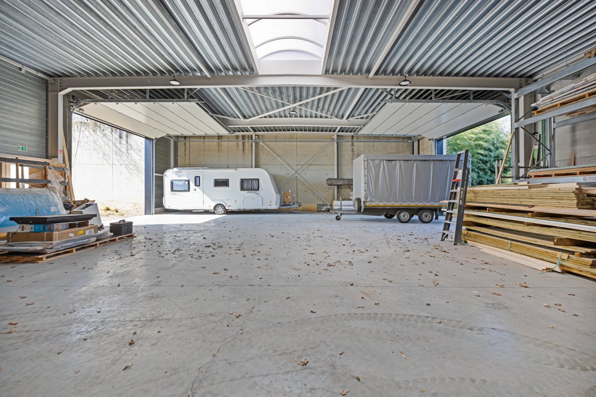 Industriegebouw met conciërge-appartement op 34a 60ca in Maaseik te koop - foto 5
