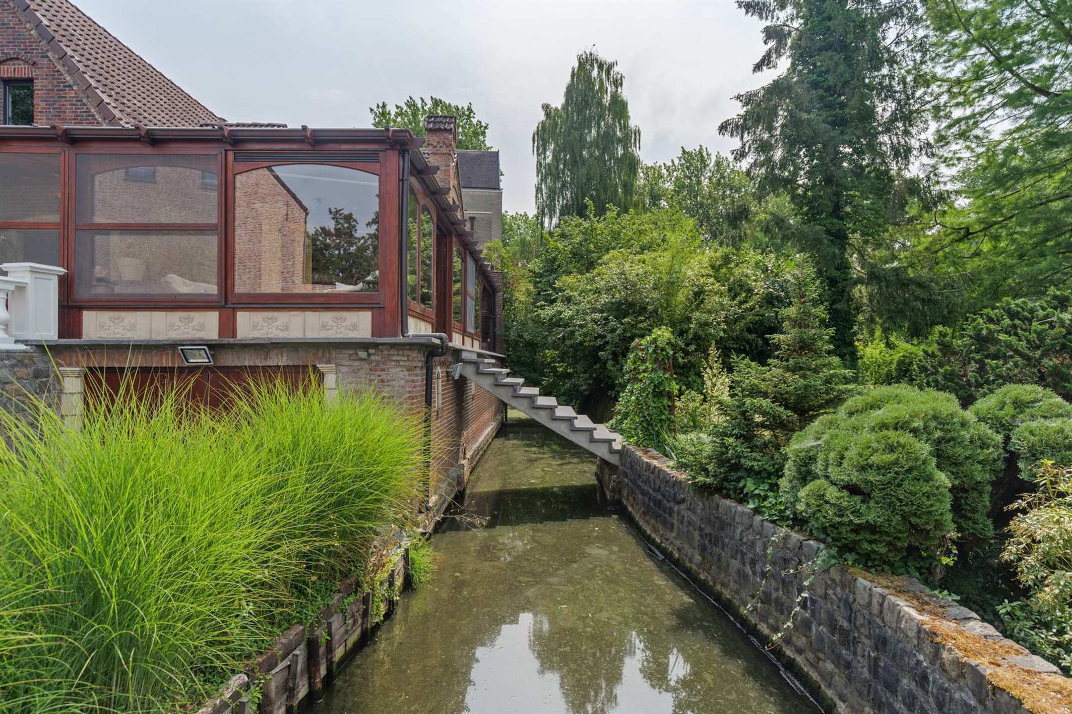 Uitzonderlijke hoeve met praktijk in oase van groen - foto 4