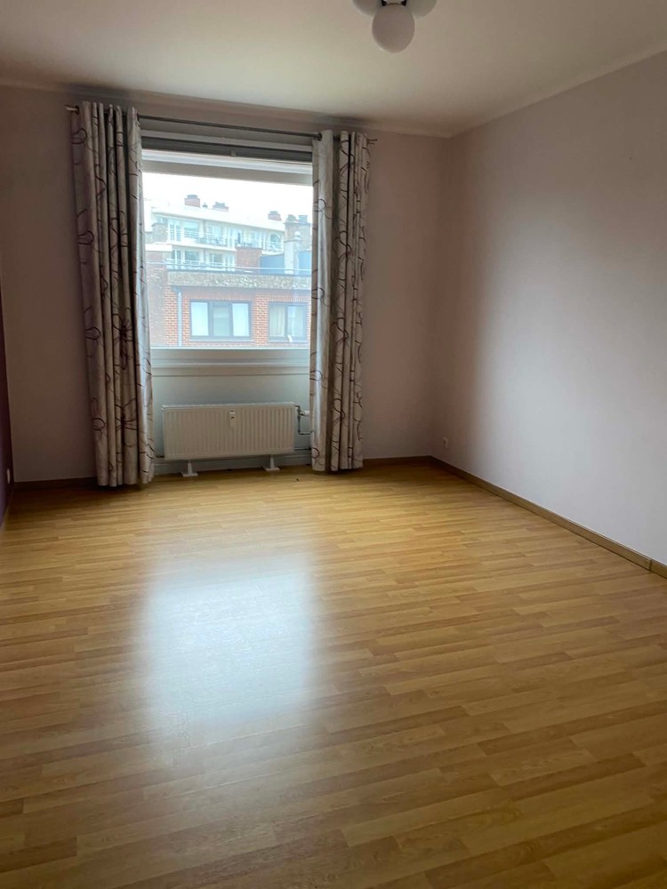 Te Huur – Goedgelegen 2-slaapkamerappartement met terras en garagebox - foto 4