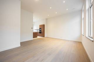 Deze exclusieve herenwoning werd hoogwaardig gerenoveerd met respect voor haar authentieke charme, gecombineerd met alle hedendaagse technieken...