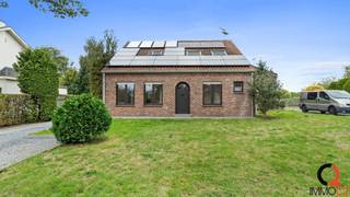 Op een vlot bereikbare locatie nabij het centrum van Tessenderlo-Ham bevindt zich deze ruime woning, gecombineerd met een privatieve tuin, garage...