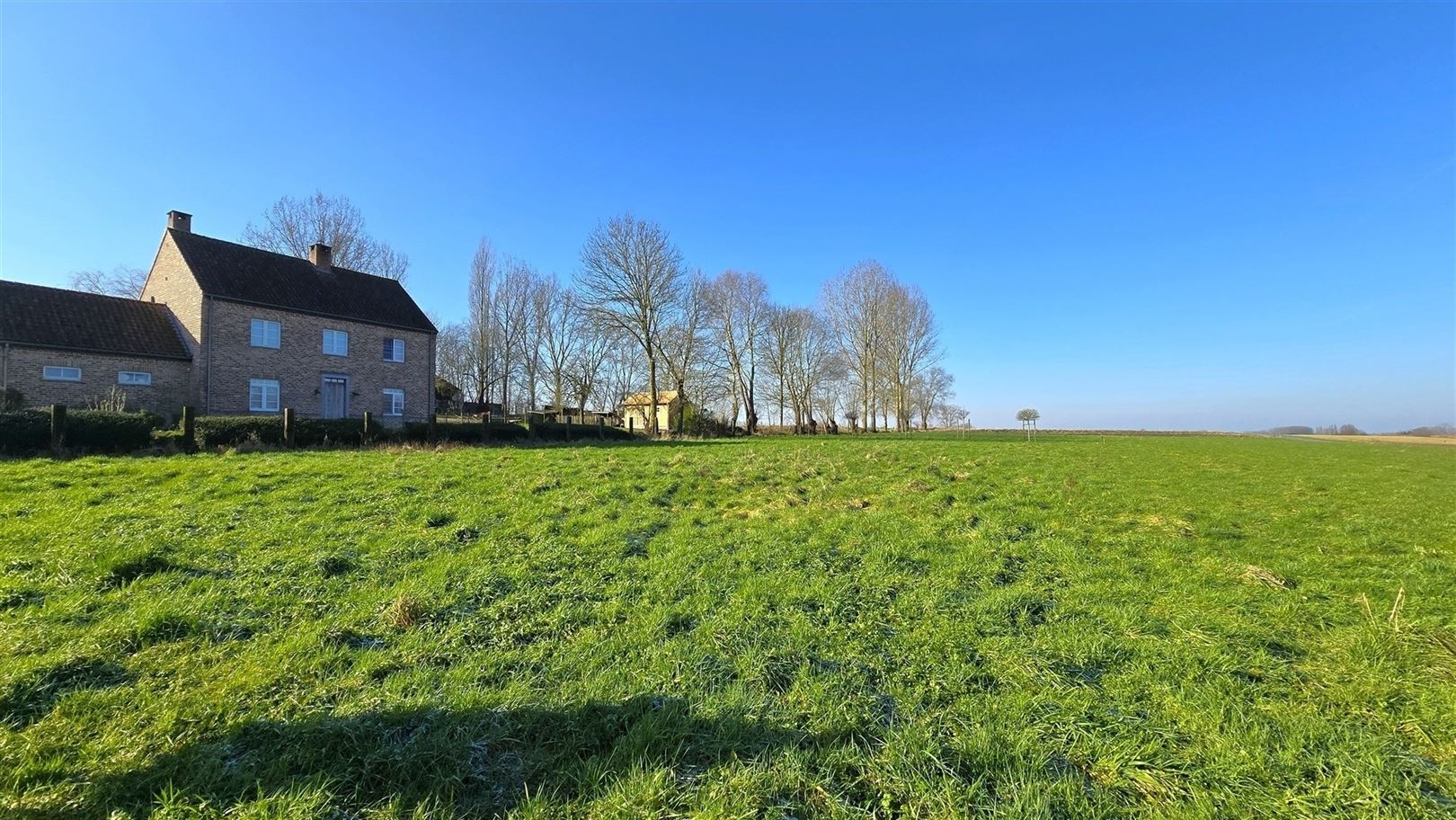 1342 m² zonovergoten bouwgrond met landelijk zicht - foto 5