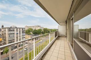 <p><span>Looking for an apartment with plenty of natural light, a beautiful view, and all the space you need to make it your own home? Then you’ve come to the right place. On the sixth floor, you’ll enjoy a spacious living area, two full-sized bedrooms, two terraces, and a parking space. Plus, you’ll be living close to Te Boelaerpark, Boekenbergpark, and all the amenities of Deurne-Zuid.</span><span><br /><br />Light, space &amp; </span><span>, and</span><span>a stunning</span><span> view<br />Take the elevator to the sixth floor, where you’ll enter the central foyer that provides access to all the rooms. At the front is the spacious living area, where the large windows immediately catch your eye. Thanks to the wide facade, you can enjoy pleasant natural light all day long and a sweeping view of the greenery and the city. The authentic hardwood floors and decorative fireplace add extra character to the space.<br /><br />Adjacent to this is the separate kitchen, practically laid out with plenty of cabinet space and countertop. From both the living area and the kitchen, you have access to the spacious front terrace, where you can enjoy sitting outside with a view of the green surroundings and the Antwerp skyline.#</span><span>NewLine#<br />Practical and comfortable</span><span> living<br />In the center of the apartment, you’ll find a separate guest restroom, several handy storage areas, and the bathroom. It’s equipped with a bathtub with a shower, a sink, and natural ventilation.<br /><br />At the rear are the two bedrooms, quietly situated away from the street. The master bedroom has space for a double bed and a spacious closet, while the second bedroom is perfect as a children’s room, guest room, or home office. Here, too, you can enjoy a beautiful, unobstructed view.</span><span><br /><br />Two terraces, a parking space, and a stunning</span><span> view<br />The two outdoor spaces are a real highlight. The large front terrace serves as an extension of the living area and kitchen, while there’s also an outdoor space at the back. This way, you can enjoy sun or shade at any time of day, depending on your preference.<br /><br />The apartment also comes with a parking space in the underground garage, so you can always park with ease. </span><span><br /><br />Green living with the city</span><span> nearby<br />You’ll live in a particularly central location in Deurne-Zuid, close to Te Boelaerpark, Boekenbergpark, and Rivierenhof. In the immediate vicinity, you’ll find supermarkets, schools, restaurants, and sports facilities. Tram, bus, and Velo are within walking distance, and via the Singel and Ring, you’ll be on your way to any destination in no time. Here, you get the best of both worlds: plenty of green space all around and the city nearby.<br /><br /></span></p>