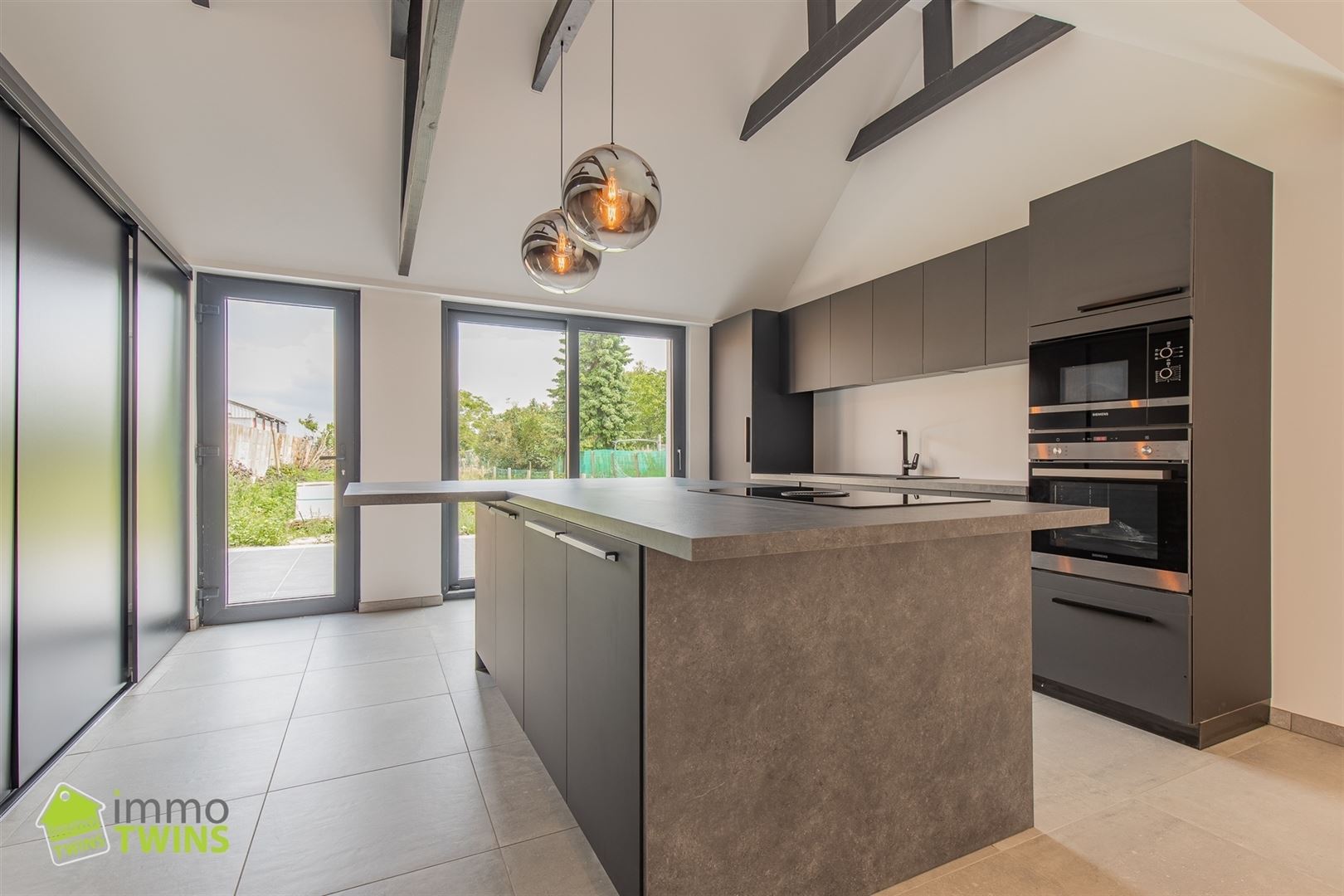 Volledig gerenoveerde gezinswoning met ruime tuin te Lebbeke - foto 4