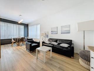 Dit appartement is voorzien van een leefruimte, keuken, 2 slaapkamers, badkamer en een terras.Eerste verdieping: - inkomhal- leefruimte met...