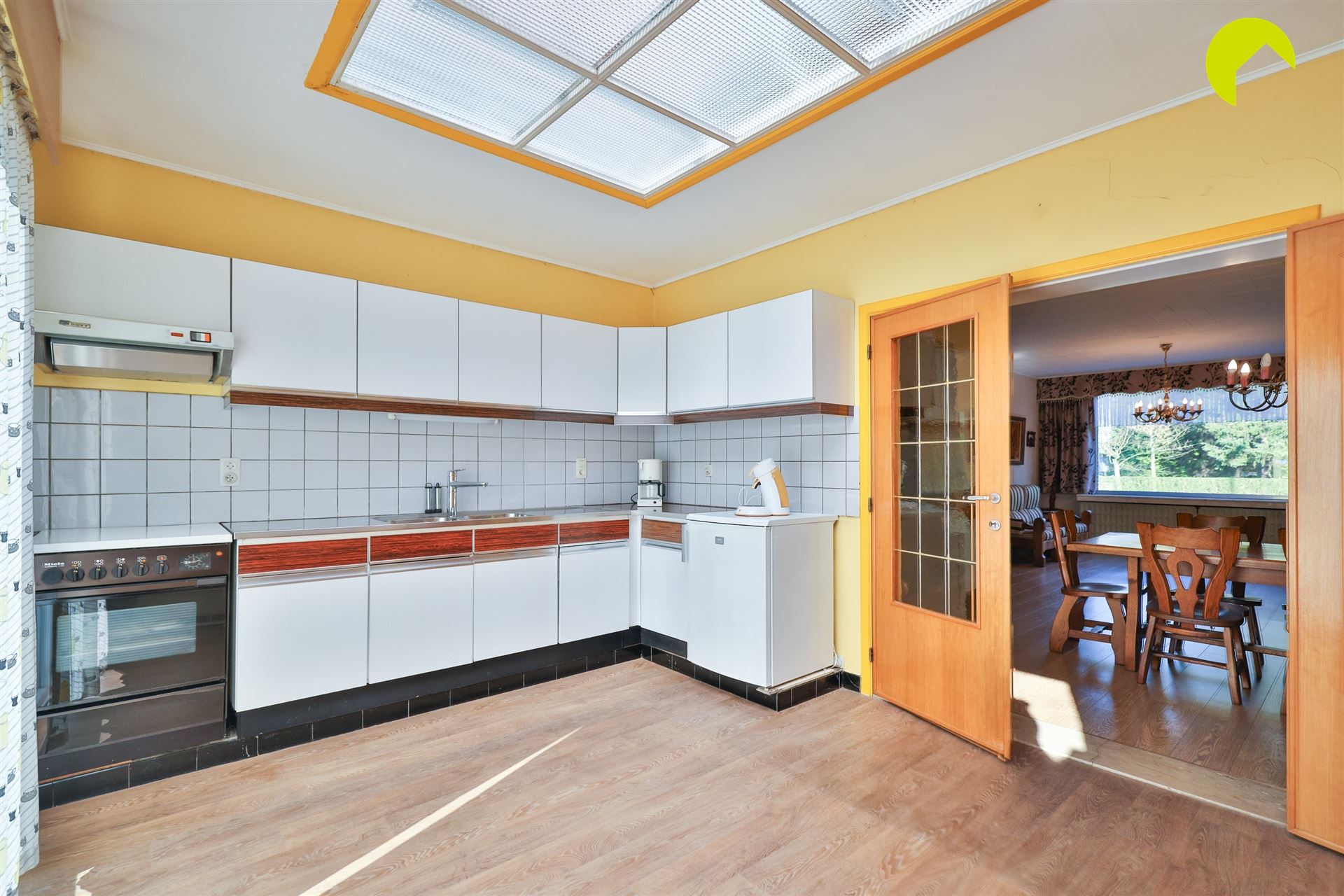 Te renoveren woning met zalige ZW-tuin! - foto 5