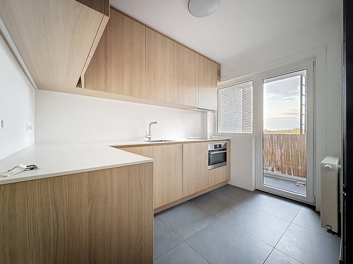 Ruim tweeslaapkamerappartement te huur in Merksem! - foto 5