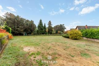 Interesse? Meer informatie op www.SWEVERS.be. - Deze prachtig gelegen bouwgrond in de Steenstraat 4 te Lummen biedt de ideale basis voor...