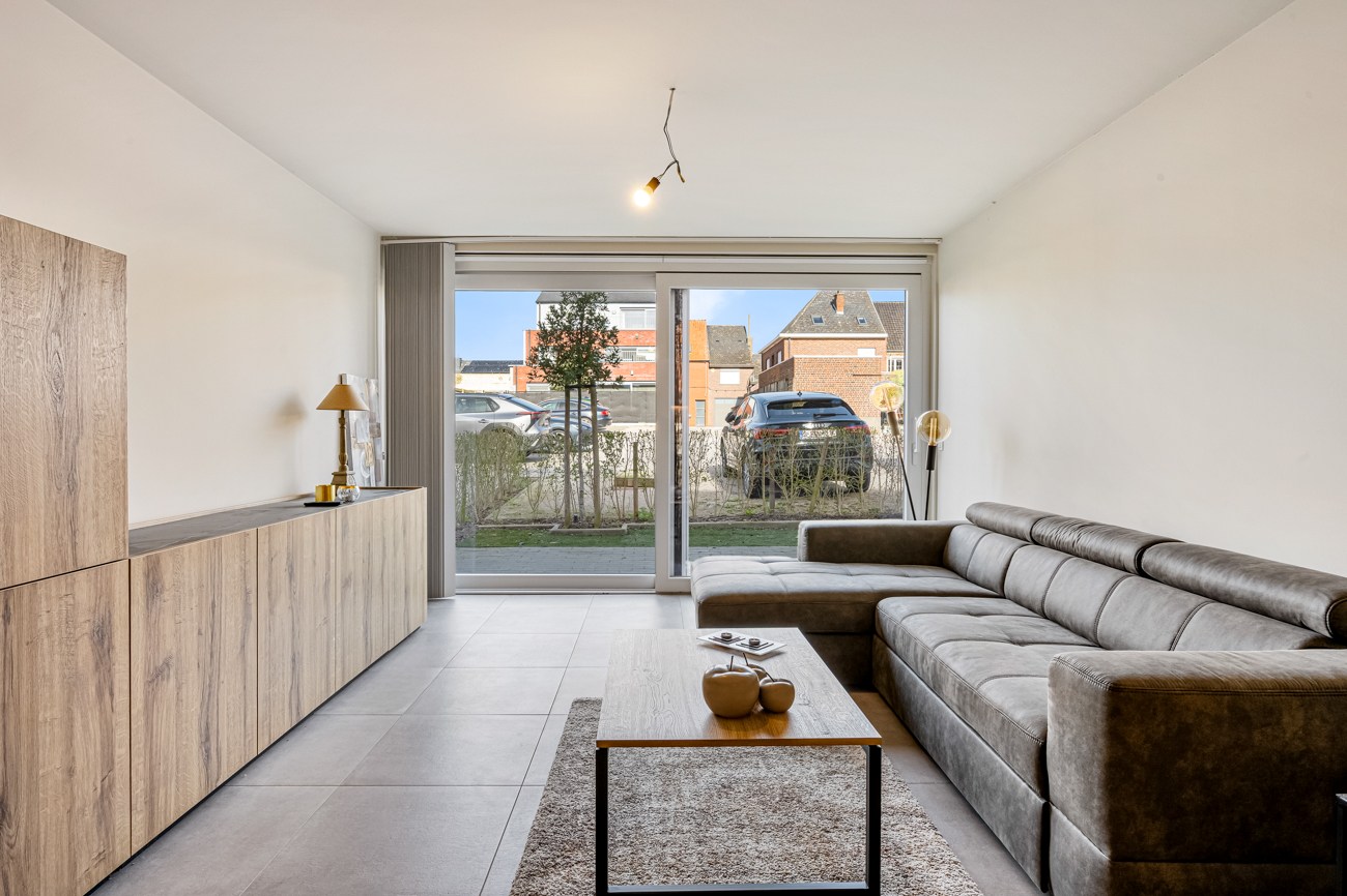 Recent gelijkvloers appartement met tuin en parkeerplaats! - foto 1