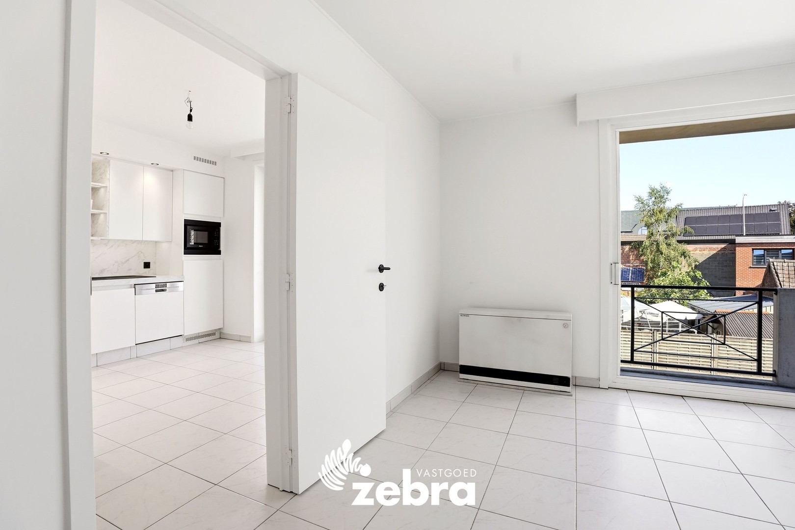 Zeer ruim appartement (137 m²) te koop met dubbele garage in het hartje van Tielt! - foto 5