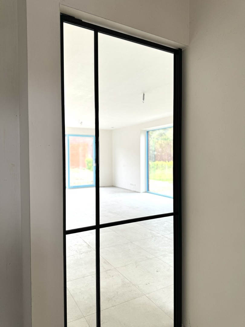 Halfopen lichtrijke nieuwbouwwoning met ruime tuin en carport op 452 m² - photo 4