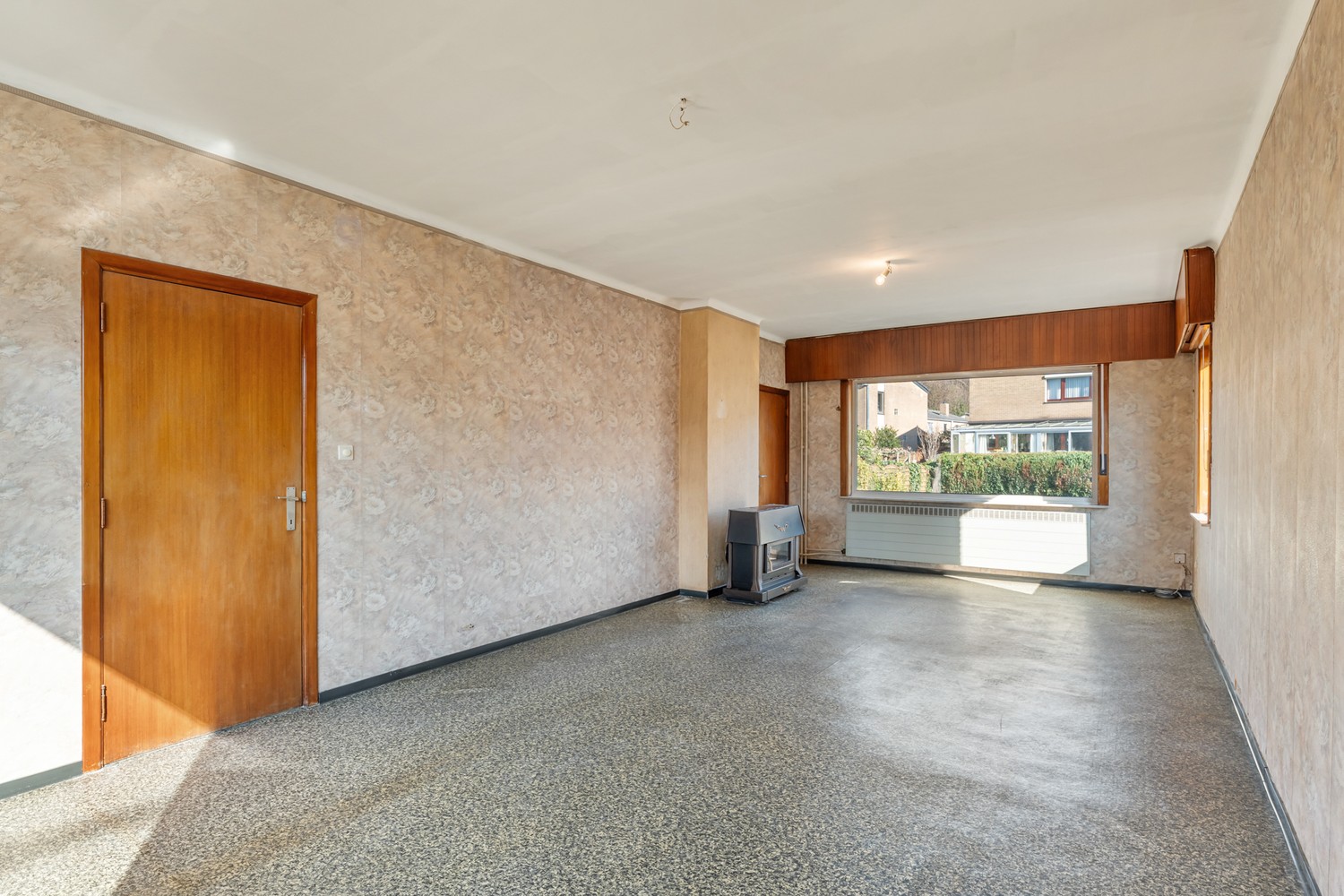 Goed gelegen en half open woning met 3 ruime slaapkamers, een extra leefruimte, een garage en een tuin te Kessel-Lo! - foto 4