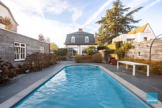 TE KOOP in Wichelen - prachtige art deco villa dd 1932 op een perceel van meer dan 30 areDeze villa kreeg een totaalrenovatie in 2015 met behoud van...