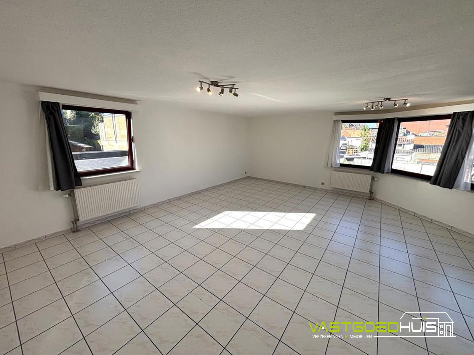 Ruim tweeslaapkamerappartement in het hartje van Liedekerke! - foto 4