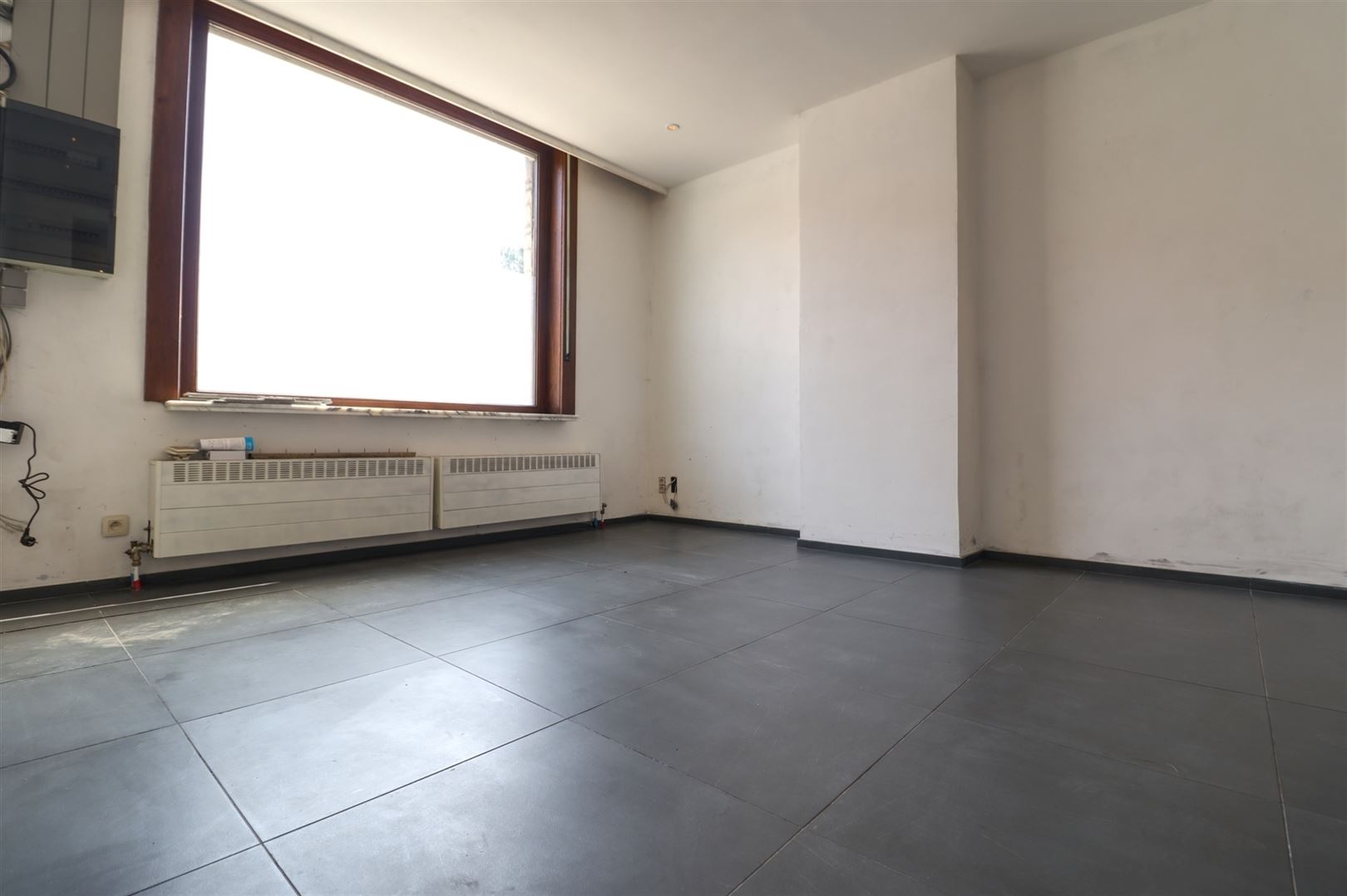 Ruime op te frissen woning met grote tuin - foto 4