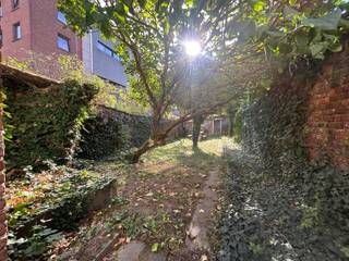 **Prachtige cohousing-woning met tuin gelegen Vesalius Leuven**Deze toplocatie is op wandelafstand van het stadscentrum, Oude en Grote Markt, Abdij...