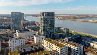 Discover pure luxury at height in this exceptional apartment located on the 20th floor of the iconic “Scheldezicht” residence, an...