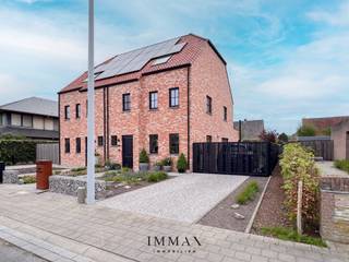 Instapklare pastorie nieuwbouwwoning met hoogwaardige afwerking en zuidoostgerichte tuin in het gegeerde Sint-Kruis!Met een uitzonderlijke EPC-score...