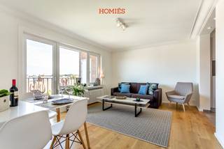 Located just a 5-minute walk from the historic center of Leuven, this fully furnished one-bedroom apartment offers a pleasant combination of comfort and natural light, featuring a spacious terrace with open views. The apartment has a surface area of approximately 60 m² and is situated on the fifth floor, accessible by stairs or elevator. Upon entering, you are welcomed into a bright living area with an open, fully equipped kitchen. The space is practically arranged and offers all necessary comfort. The bedroom is quietly located at the rear of the building. The bathroom is equipped with a sink, walk-in shower, and toilet. The apartment is rented fully furnished and includes, among others, a washing machine, combi-oven, coffee machine, toaster, cutlery, mattress, and duvet. Bike storage is available, and maintenance and cleaning of the common areas are included. Rent: €1,450 per month, plus €150 for heating and hot water. Electricity is to be arranged individually. Available from May 6th, 2026. For more information: info@homies.be