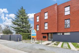 Voor meer info of een bezoek, bel 053 59 49 32 - TE KOOP - Dit instapklare gelijkvloers appartement combineert comfort met energiezuinig wonen...