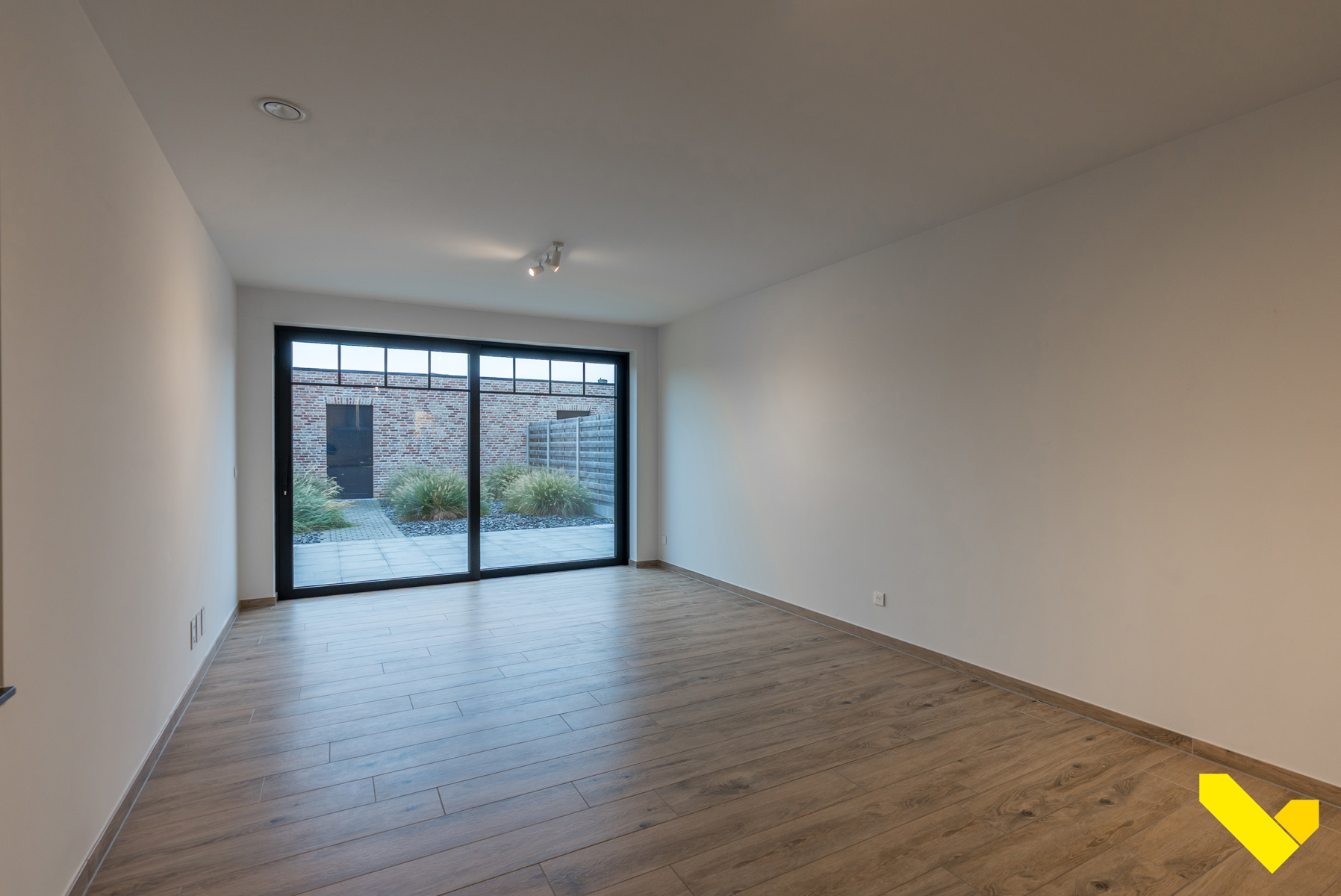 Recent gelijkvloers appartement met gezellige tuin en garage - foto 4