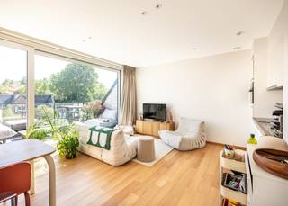 Modern apartment with a spacious terrace (16 m²) and a beautiful view of the Hoge Blekker in Koksijde.<br /><br />This move-in-ready apartment is located in the recently built Bries en Boei residence (2025), ideally situated on Zeelaan in Koksijde. The bustling commercial center of Koksijde-Bad is just 400 meters away, while the beach and the sea are also within walking distance (approx. 600 meters).<br /><br />The property is laid out as follows: A bright living area with a fully equipped, open kitchen featuring high-quality appliances and direct access to the spacious terrace (16 m²) | a practical storage room with connections for a washing machine and dryer | a full-sized bedroom with built-in closet and an adjoining bathroom (equipped with a walk-in shower, vanity sink, and toilet).<br /><br />On the basement level, the apartment features a private storage room with electrical hookups and a communal bicycle storage area. Additionally, there is the option to purchase an easily accessible underground parking space for €29,000.<br /><br />Highlights of this apartment:<br />- Apartment in like-new condition (built in 2025)<br />- Energy-efficient (EPC rating A)<br />- Electrical system compliant through 2049<br />- High-quality finishes<br />- Spacious 16 m² sun terrace with a beautiful view of the Hoge Blekker<br />- Private basement with electricity<br />- Shared bicycle storage<br />- Option to purchase an underground parking space<br /><br />The purchase is subject to both registration fees and VAT.<br /><br />Are you looking for a recently built, energy-efficient apartment with a spacious terrace and a unique view of the Hoge Blekker? Contact us today for more information or to schedule a visit.