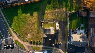 Projectgrond van 20a21 voor een handelspand van 454,29 m² en 3 appartementen, gelegen op de hoek van de Rijksweg en de Kerkstraat in...