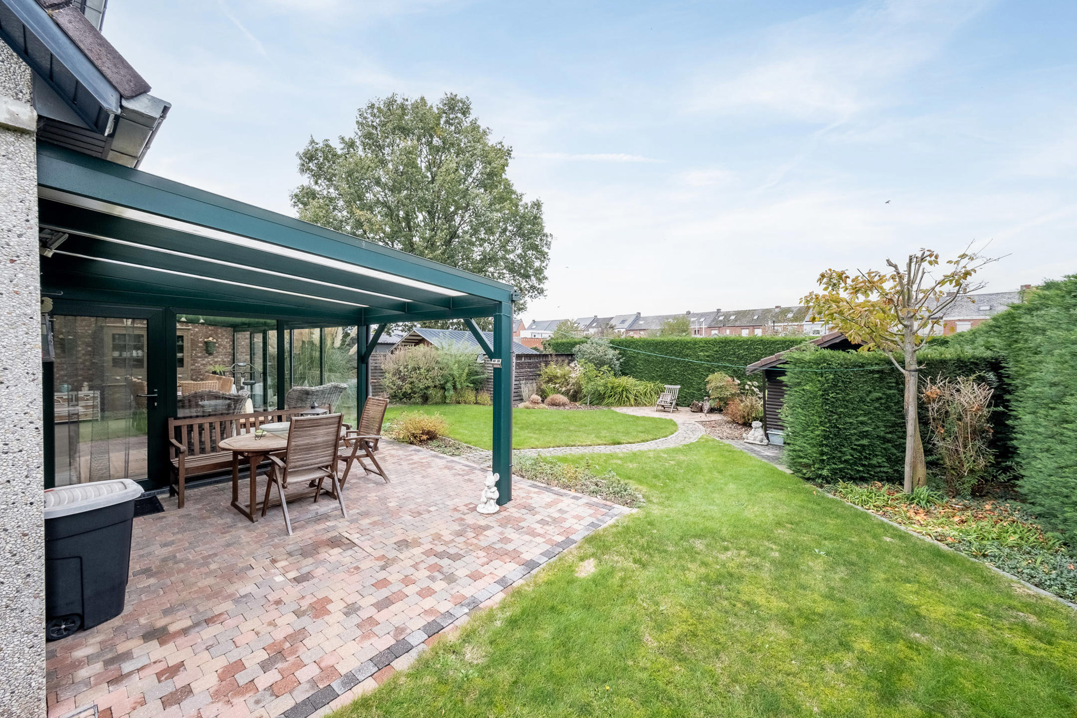 Halfopen bebouwing met aangename tuin en garage - foto 3