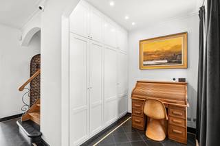 <p>Are you looking for a characterful townhouse in a prime location in the center of Lier? Then this is your opportunity. This beautifully renovated and charming home is a true gem, where all assets come together and where every step continues to surprise.</p><p>You are welcomed through the spacious entrance hall, which immediately conveys a sense of openness and elegance. Here you will find a practical cloakroom and a guest toilet. From the entrance, you already catch a glimpse of the inviting living area, where the fireplace takes center stage and guarantees warm, cozy moments. Adjacent is the dining room, which, thanks to its direct connection to the garden, is bathed in natural light. Every season brings its own unique atmosphere, enhanced by the abundant daylight.</p><p>The separate kitchen is fully equipped with modern appliances and offers every comfort for cooking enthusiasts. The adjoining utility room is an added practical advantage and integrates seamlessly into the whole. In addition, there is a spacious storage room with direct access to the garden.</p><p>The city garden is a true oasis of tranquility, a rare luxury in the heart of Lier. The charming garden pavilion completes the setting and can be arranged as a lounge, covered outdoor kitchen, BBQ area, or even a wellness space with a jacuzzi — the possibilities are endless.</p><p>Via the elegant staircase, we reach the first floor, where you will find three full-sized bedrooms and a centrally located bathroom equipped with a bathtub, shower, and double sink.</p><p>The top floor houses the master bedroom, a unique and versatile space that immediately charms with its beautiful exposed beam structure. Here too, comfort is guaranteed, with a fully equipped private bathroom.</p><p>This property perfectly combines space, light, comfort, and character in an exceptional location. Are you ready to be convinced by this unique living experience? Contact us today to schedule a viewing and discover the many additional features this home has to offer.</p><p>Contact your real estate agent for more information:<br />0488 42 42 24 – Nico Di Taranto</p>