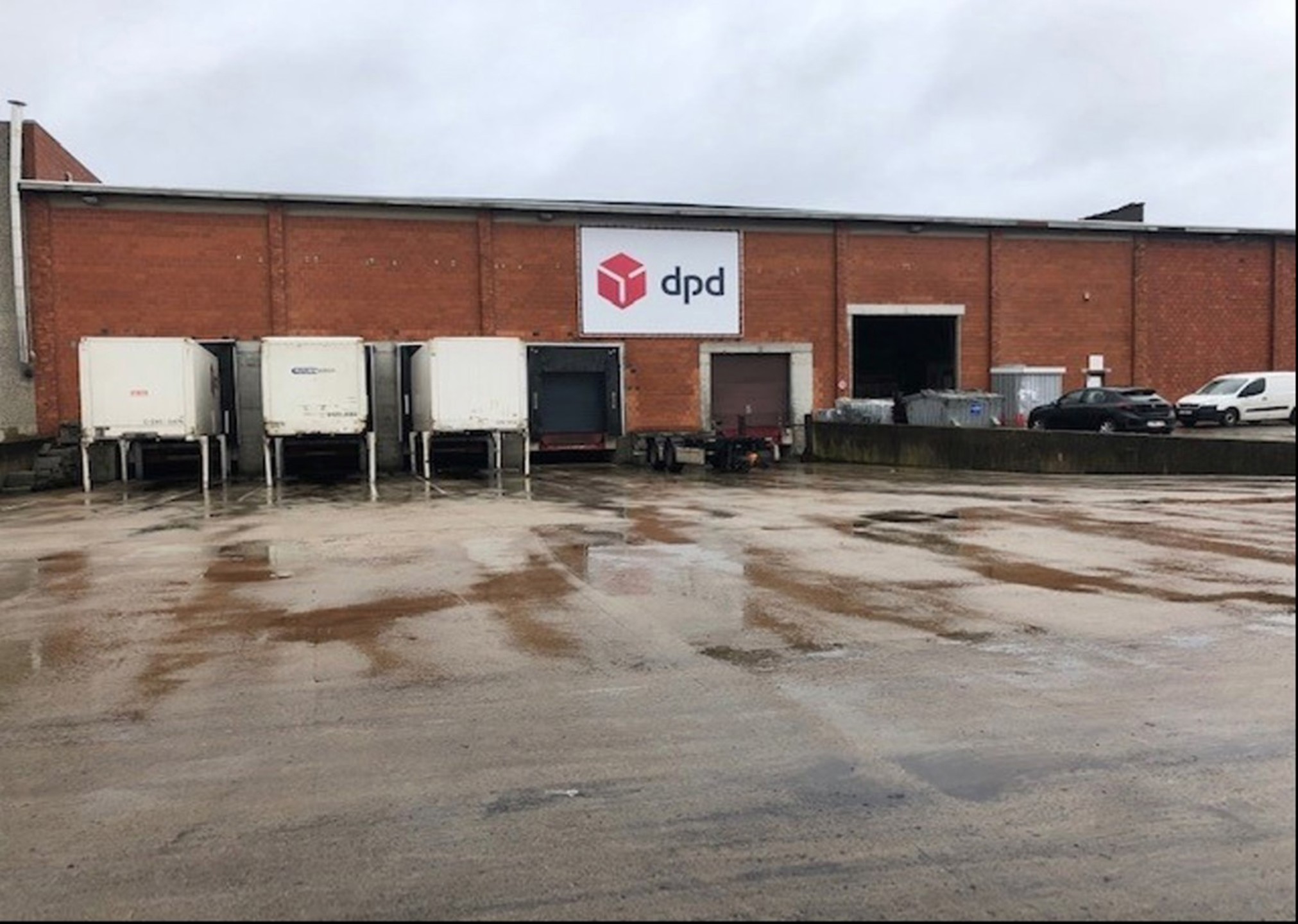 Magazijn 2.500m² meteen sectionaal poort - foto 1