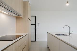 Do you dream of living beautifully along the renovated Leieboorden in Harelbeke? Residentie Leiesluis offers you this unique opportunity!This exclusive new construction project, developed by Groep Berton and Dehullu Architects, has already sold 92%. Take a chance now!We would like to introduce you to apartment 0.07, a spacious and luxurious home with every comfort.- A generous living area of 108.35 m²- A lovely 9 m² terrace with a view of the LeieLayout:- Night hall- Separate guest toilet- Spacious storage room with connection for the washing machine & dryer- Bright, spacious living space with open kitchen- Fully equipped kitchen with stove, hood, fridge, dishwasher, oven and microwave- 3 bedrooms- 2 bathrooms- Sunny terrace Extra benefits:- Excellent location with a view of the Leie in Harelbeke1- Within cycling distance of domain 'De Gavers' and the city of Kortrijk- The project connects to the heat network, which ensures a very high energy efficiency- Energetic topper- The apartment was completely paintedEPB in format