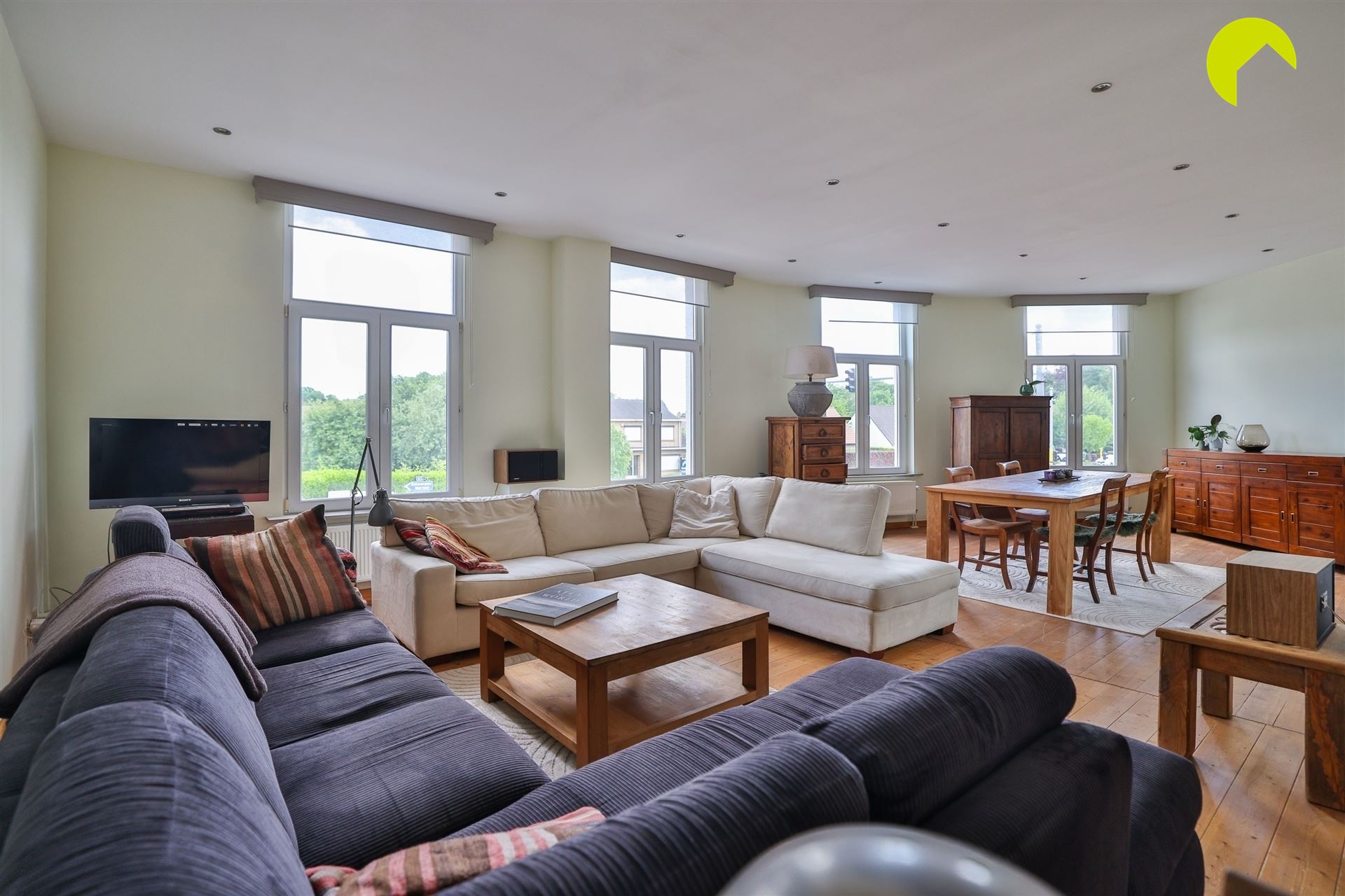 Polyvalent eigendom met handelsgelijkvloers en duplex appartement - foto 2