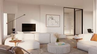 <p>Nestled between the lively waters of the Scheldt and the Bonaparte Dock, a place once known for bananas and trade is making way for an elegant new future defined by balance and beauty.</p>
<p>The site’s fruity past lives on in Friendship Residence, a subtle tribute to its history. The future here is bright and full of potential. This is where the vibrant rhythm of the city merges seamlessly with the calm of the water.</p>
<p>In the fusion of luxury and artistic boldness, Friendship Residence finds its perfect emblem.</p>
<p>Friendship Residence was designed through a collaboration between the Antwerp-based studio HUB Architecten and the London practice DRDH Architects. The result is a unique interplay of local sensibility and international perspective.</p>
<p>Their vision takes shape as a contemporary ode to the historic warehouse architecture of Het Eilandje. Here, there is no fragmentation, only visual harmony. A carefully composed ensemble in which each building has its own identity and atmosphere. A place designed not only for living, but above all for experiencing.</p>
<p>From the outside, Friendship Residence immediately makes a striking impression. High-quality façades with green accents, refined detailing and expansive windows create an aesthetic enrichment for the neighbourhood. Mineral materials were consciously selected to honour the character of the location, ranging from the iconic warehouse style to urban buildings with brick accents.</p>
<p>That sense of quality is felt down to the smallest detail upon arrival. Through the luxurious entrance halls, residents enter the buildings in a stylish transition from the city to their personal haven.</p>
<p>The spacious inner garden was designed by renowned landscape architect Erik Dhont. With internationally acclaimed projects and as laureate of the prestigious competition for the new palace gardens in Brussels, the studio guarantees a landscape design of royal calibre.</p>
<p>The unmistakable charm of this hidden oasis invites residents to slow down and savour the moment. A lush interplay of flowers, shrubs and trees creates a sheltered retreat that briefly makes the pace of the city disappear. Natural stone pathways guide you along a reflective water feature radiating serenity, with inviting resting spots that encourage you to enjoy both sun and shade.</p>