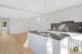 <p><span>For sale: spacious and bright renovated apartment with terrace and favorable EPC:</span></p><p><span>This small renovated building has 3 characterful apartments renovated according to the new living requirements. The typical elements have been preserved and the apartments are very bright and decorated with neutral materials.  They are also ideally located in lively Mortsel very close to public transport, stores and green spaces. </span></p><p><span> </span></p><p><span>The apartment on the 3rd floor has a comfortable living space with open kitchen, followed by a cozy terrace and 2 bedrooms and bathroom with walk-in shower.  </span></p><p><span> </span></p><p><span>The apartment has the following layout:</span></p><p><span> </span></p><p><span>Entrance hall</span></p><p><span>From the staircase you enter the hall with separate toilet and possibility for checkroom.  Furthermore, there is a storage room where connection for washing machine and dryer is provided. </span></p><p><span> </span></p><p><span>Living room and kitchen:</span></p><p><span>The living room on parquet is very cozy due to the beautiful authentic arch and view of greenery. </span></p><p><span>The kitchen with cooking island has an oven, refrigerator, freezer, induction stove, dishwasher and 1.5 sink. You do not have to go far from the kitchen to enjoy dinner on your terrace.</span></p><p><span> </span></p><p><span>Bedrooms</span></p><p><span>The 2 bedrooms are spacious and located at the front allowing you to enjoy the sun in the morning.</span></p><p><span> </span></p><p><span>Bathroom</span></p><p><span>The bathroom has a walk-in shower, spacious sink and towel dryer.</span></p><p><span> </span></p><p><span>In short, this renovated apartment on the third floor offers everything for someone looking for comfort and tranquility but at the same time close to all amenities. </span></p><p><span>Also available in the same building on the 1st and 2nd floors is an apartment  . </span></p><p><span> </span></p><p><span>Additional Information</span></p><ul><li><span>EPC B :  111 kWh/(m² year)</span></li><li><span>Cellar storage</span></li><li><span>High quality finishing </span></li><li><span>Terrace </span></li><li><span>Shared bicycle storage</span></li><li><span>Separate meters</span></li><li><span>Low cost due to small building</span></li><li><span>Purchase under registration </span></li></ul><p><span> </span></p><p><span>Request a visit through our website  <span>www.coprimmo.be</span></span><span> or by phone 03/449.49.77.</span></p><p><span>Don't miss this unique opportunity!</span></p><p><span> </span></p><p><span>Do not miss this unique opportunity!</span></p><p><span> </span></p><p><span>This apartment is sold under VAT </span></p>