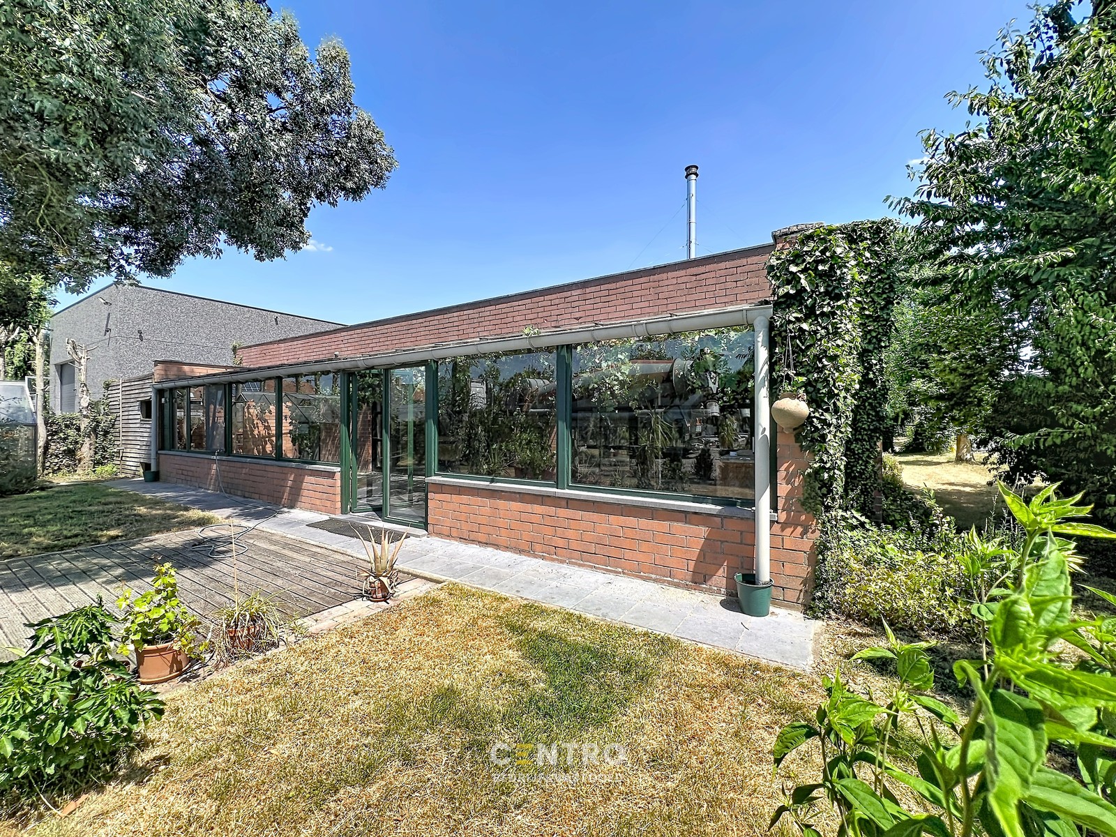 Kantoor met magazijn: perfecte combinatie van ruimte en functionaliteit met een weelderige tuin (Oostnieuwkerke-Staden)! - photo 4