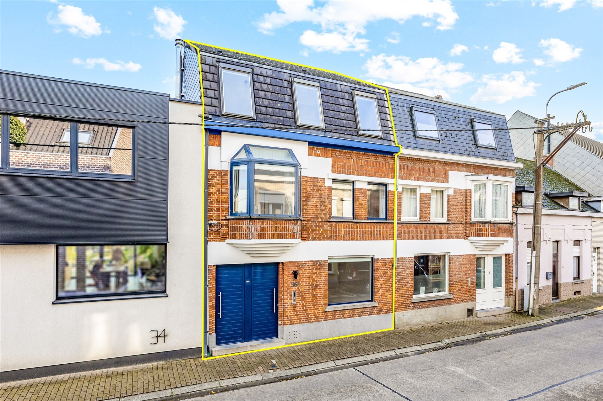 Gezellige rijwoning met uitzonderlijke grote tuin en externe garage in hartje Schellebelle - foto 2