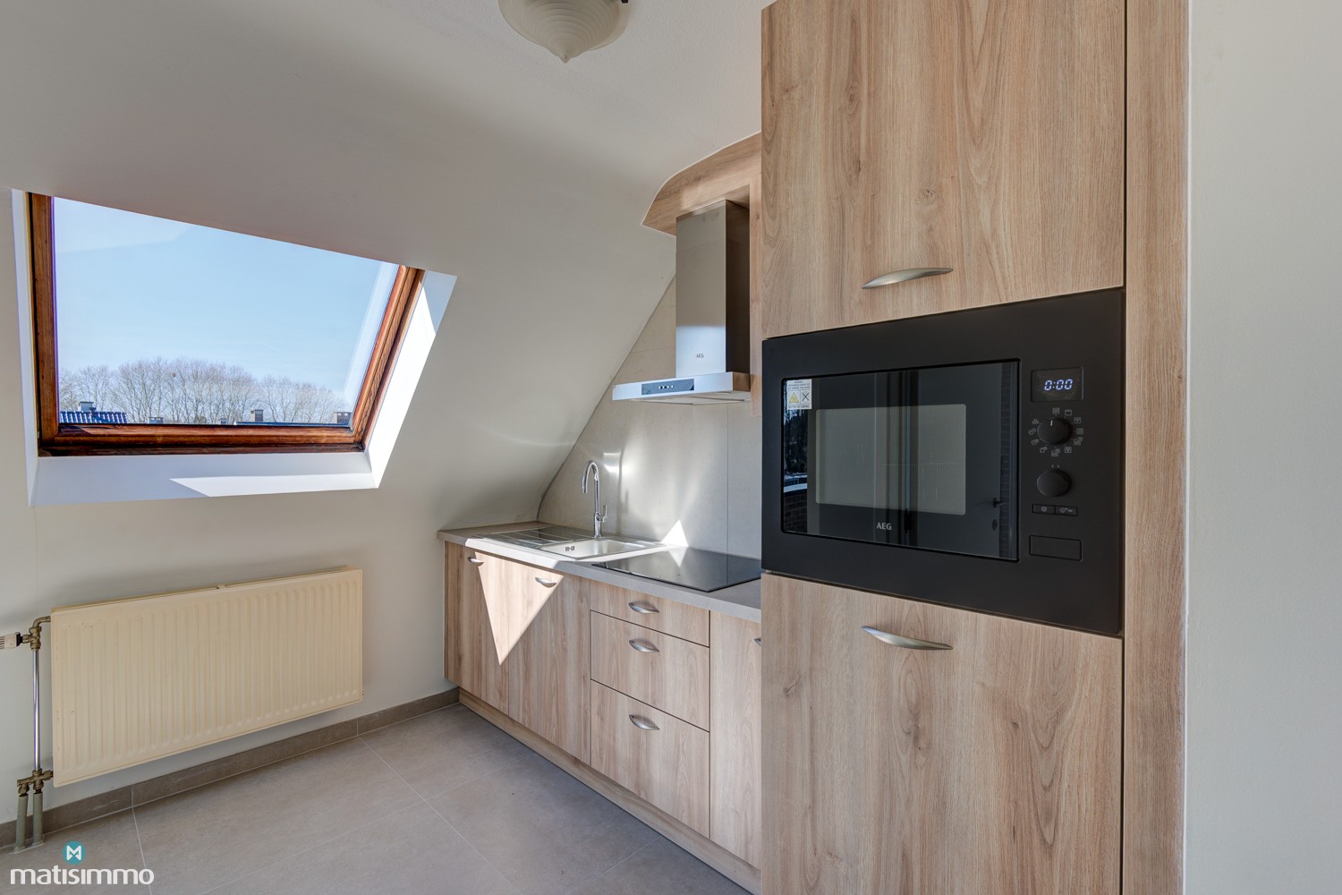 INSTAPKLAAR DUPLEX-APPARTEMENT MET 2 SLAAPKAMERS EN GARAGE NABIJ HET CENTRUM VAN BILZEN - foto 5