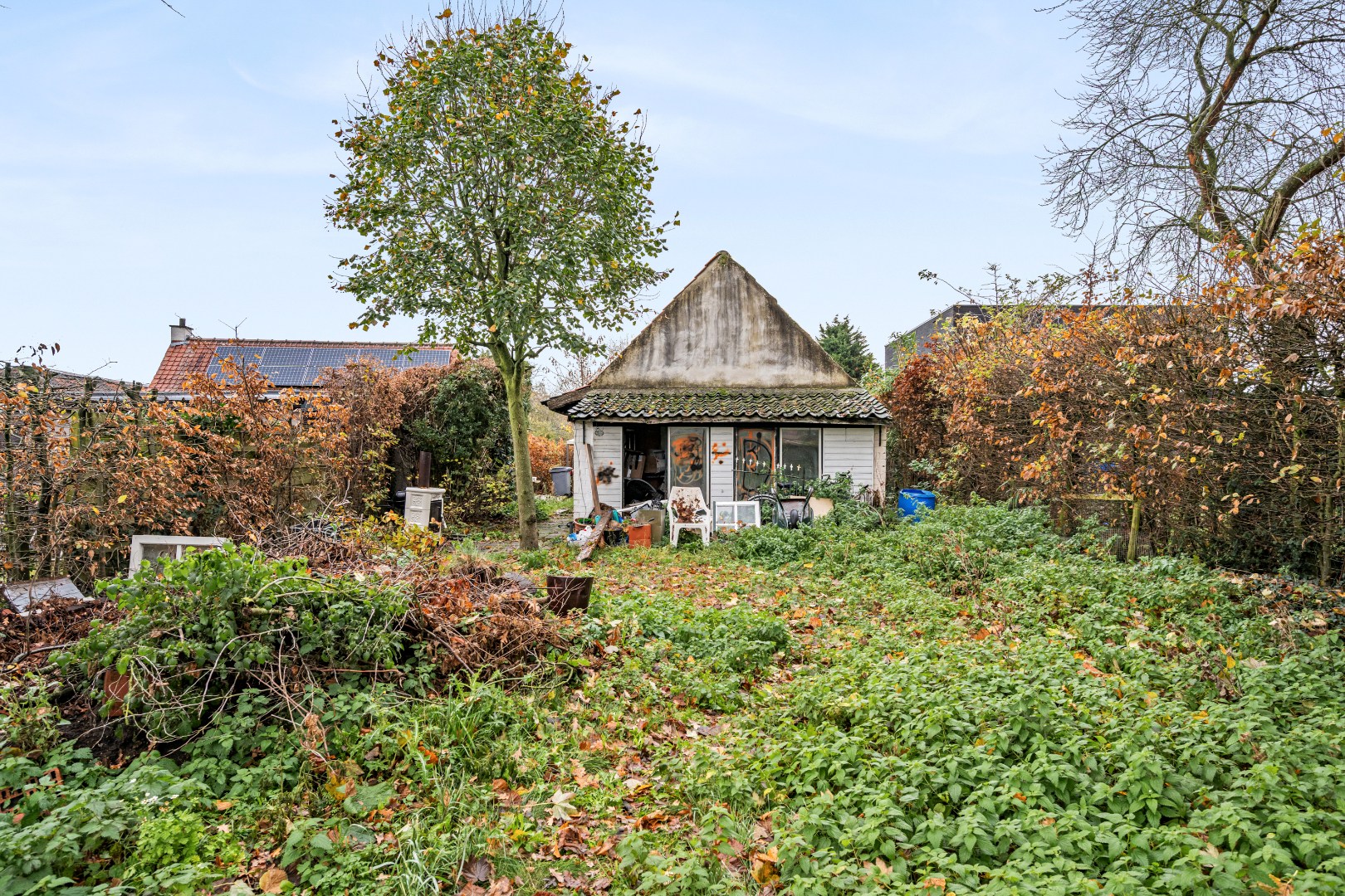Charmante verder af te werken woning met ruime tuin - foto 5