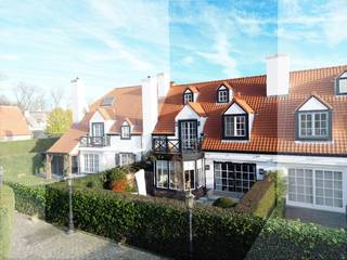 Exclusief te koop: Charmante instapklare woning met een gezellige tuin en een zonnig terras, ideaal gelegen vlakbij het Oosthoekplein in Het...